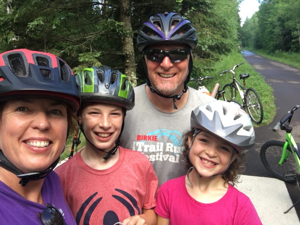 family riding bike