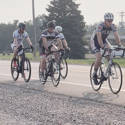 Riders head north to quieter roads at the start of the road ride.