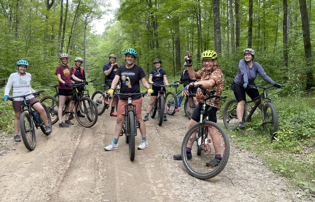 New Moon's mountain bike groups come together before continuing on their return ride