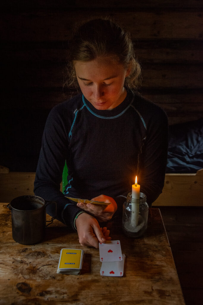 Playing cards by candlight 