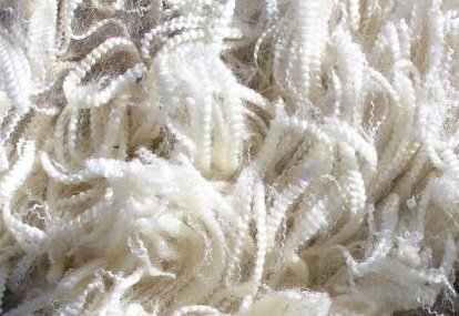 Wool has crimping and texture that helps to keep you warm.