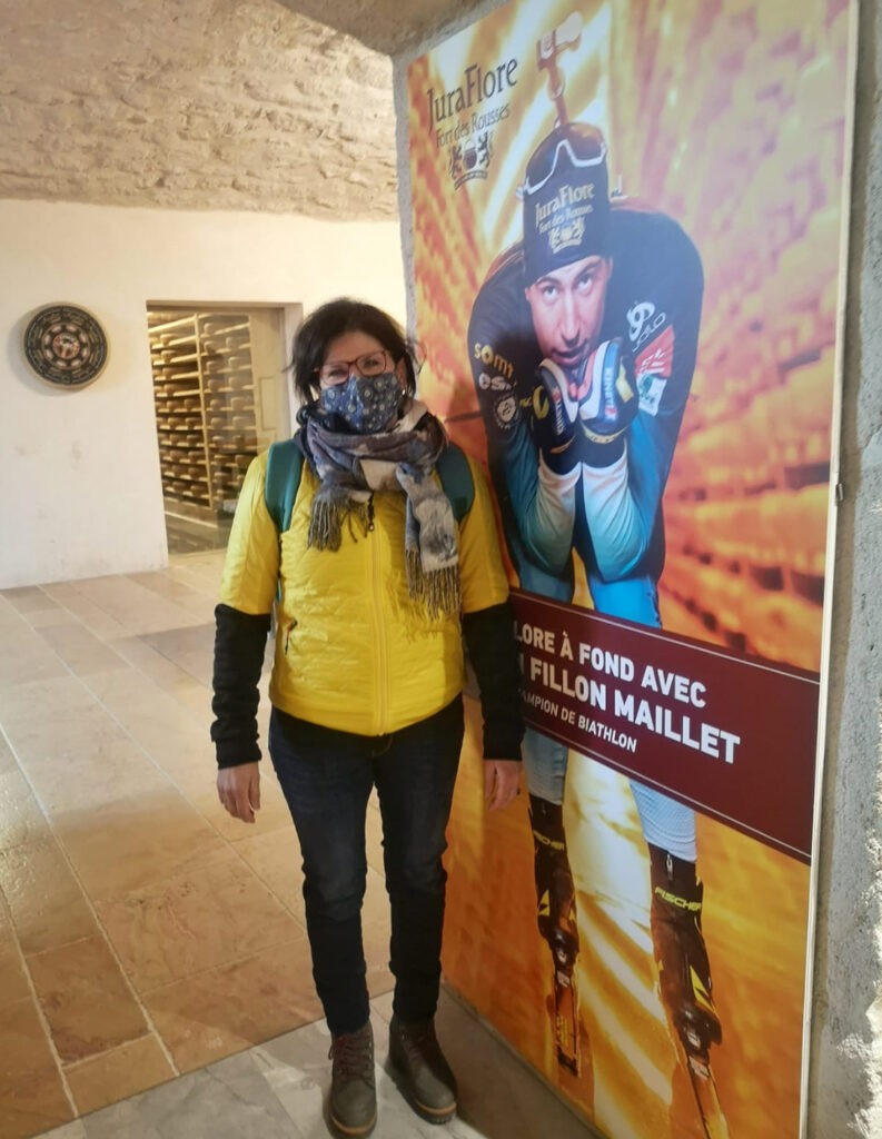 Teacher poses with student biathlete at the Comte Cheese Fortress.