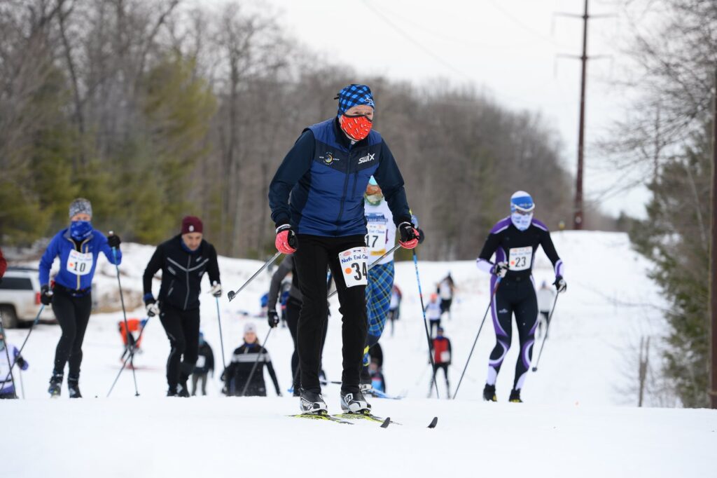 Skiers head off the power line and into the woods during the North End Classic.