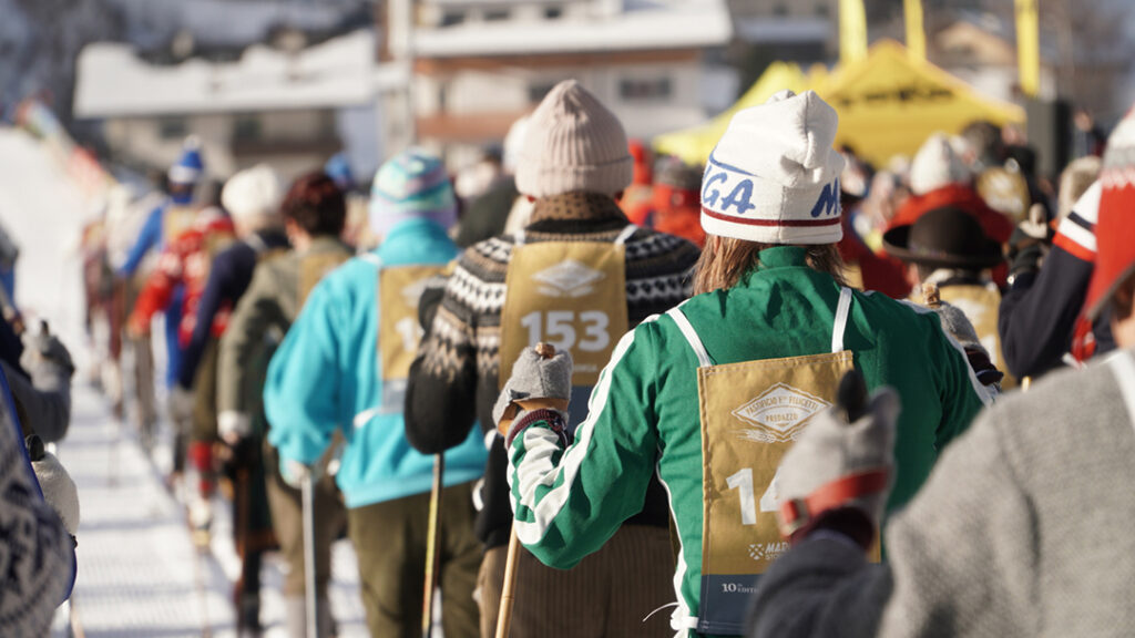 Skiers at the start of the Marcialonga Story vintage ski event.