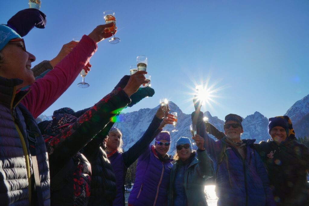 Lumi guests raising a glass to celebrate their trip to Slovenia