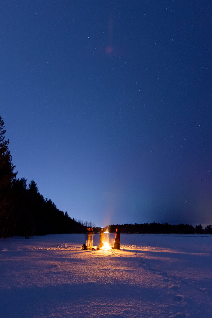 nighttime campfire after a nordic skating outing