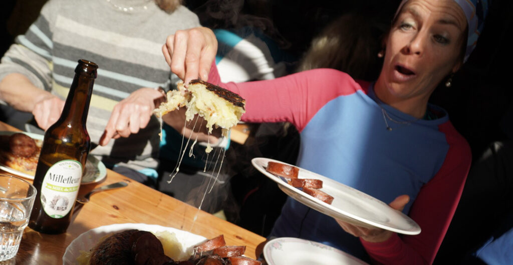 Lumi trip leader Adele helps serve healthy portions of Rosti potatoes.