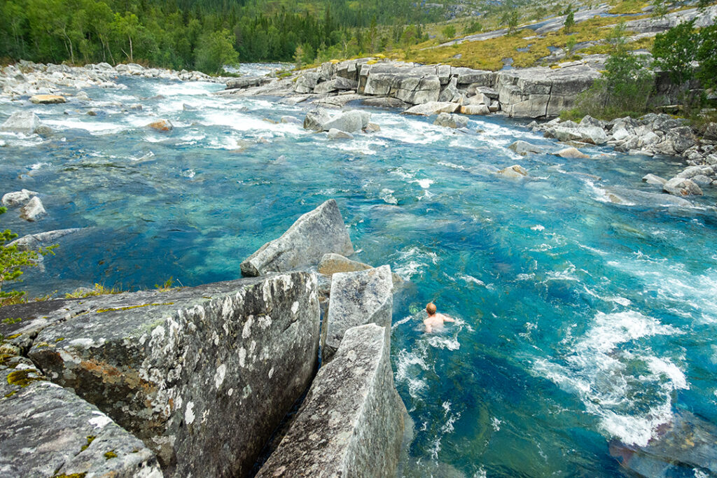 Crystal blue water running from the glacier in Lomsdal-Visten National Park.