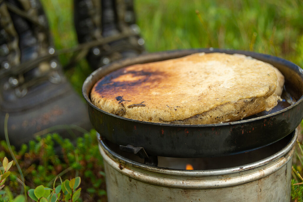 Warming up with camp food.