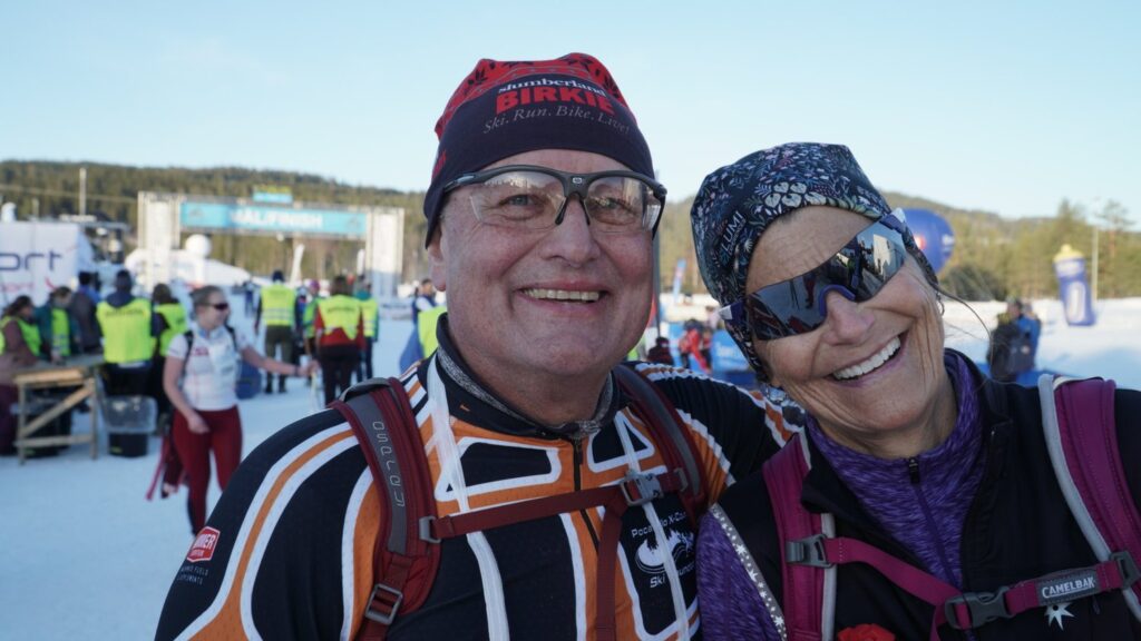 Lumi guests Bill and Meg celebrate skiing the Norwegian Birkebeiner.