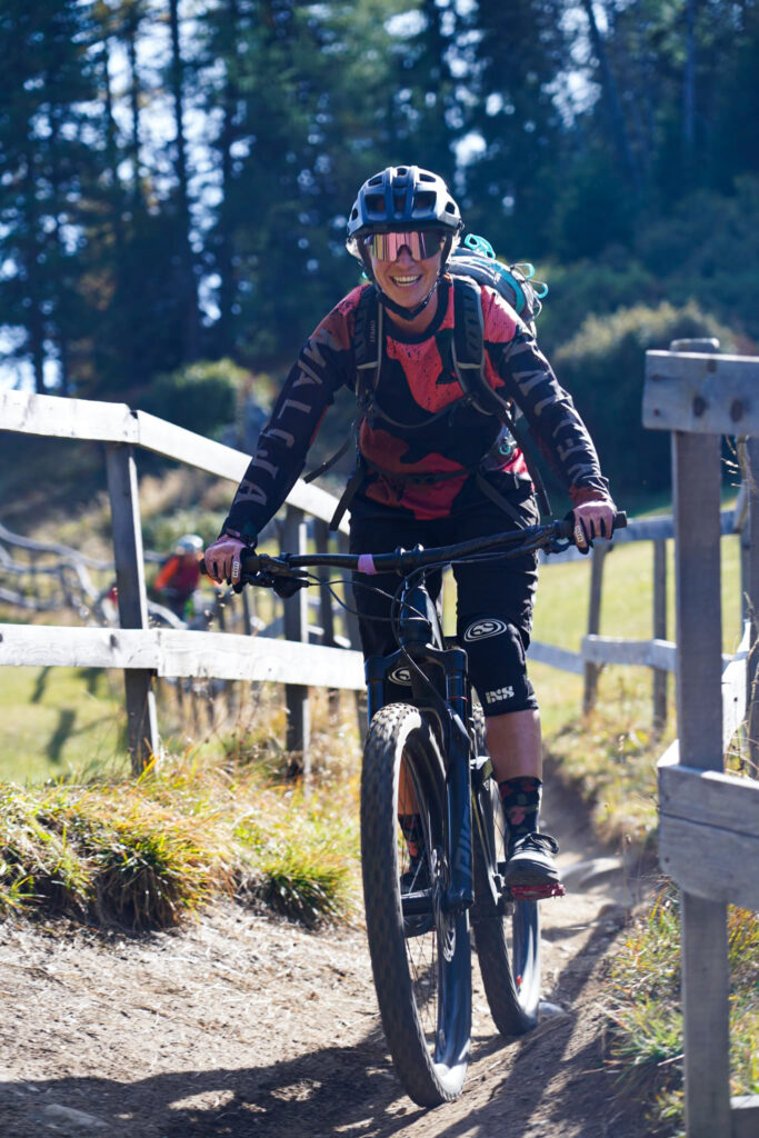 Fences separate pasture from bike trails.