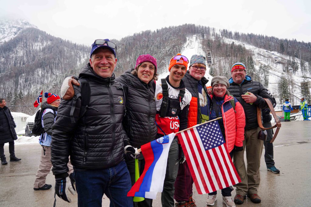 New Moon Ski Shop owners greet their staff member Chris Hecker, who also waxes for the US Team