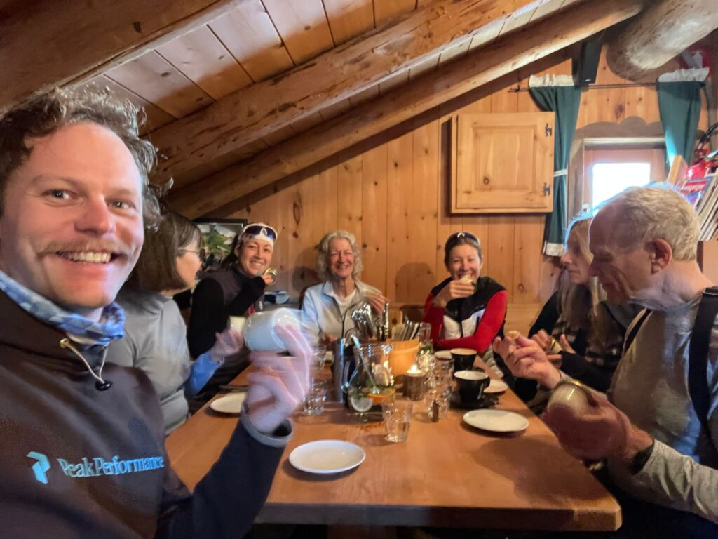 Enjoying a cozy meal at a trailside restaurant in Seiser Alm.