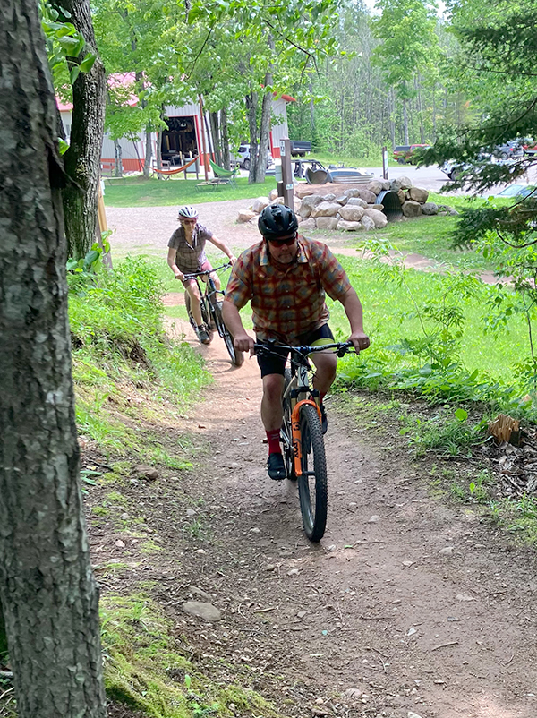 Chris leads Kristy into the WinMan trails.