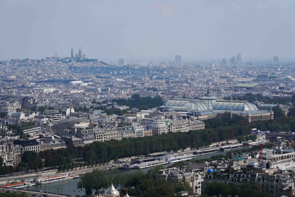 
View of Sacré Coeur Basilica atop Montmartre and Grand Palais -- site of the fencing competitions.