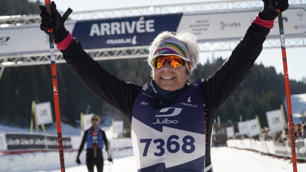 Lumi skier celebrating at the Transju finish line.