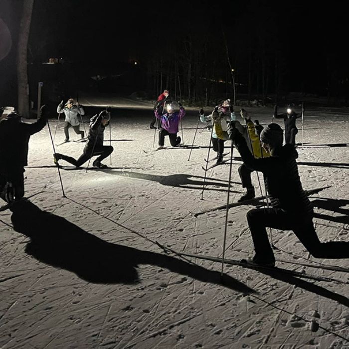 
Pre-ski stretching. Photo by Kristin Frane.