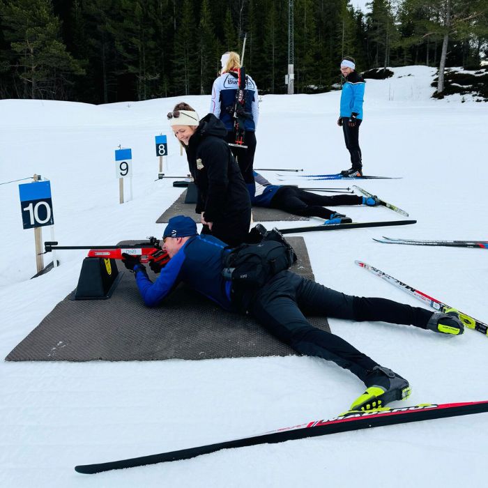  Learning biathlon from Lumi trip leader Linda who's a retired biathlete.